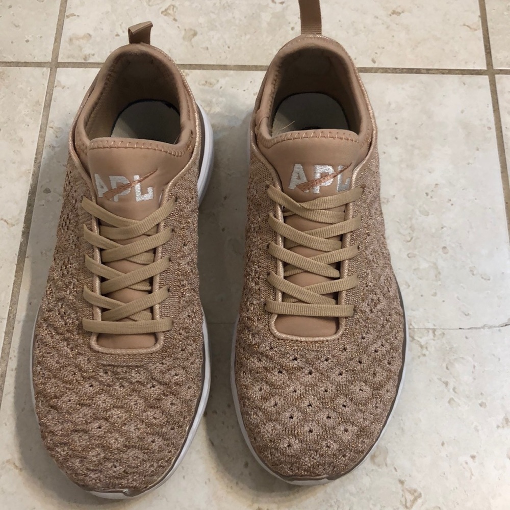 APL rose gold tennis shoes size 8.5